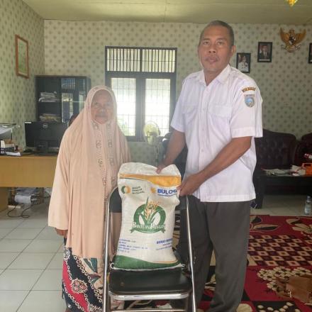 Penyaluran Bantuan Pangan Berupa Beras oleh Pemerintah Desa Pasiraman